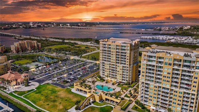 130 Riviera Dunes Way Unit 502, Palmetto, FL 34221 - aerial view at dusk featuring a city view and a water view