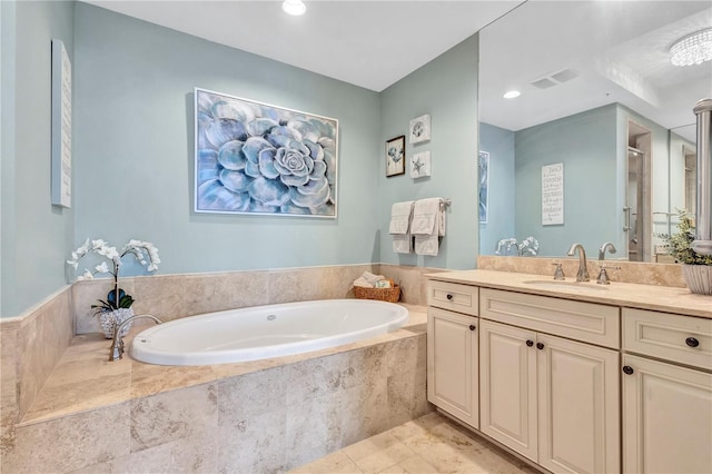 130 Riviera Dunes Way Unit 502, Palmetto, FL 34221 - full bathroom with vanity, recessed lighting, a shower with door, visible vents, and a garden tub