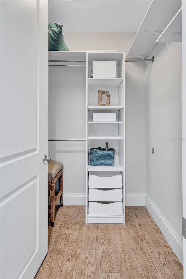 130 Riviera Dunes Way Unit 502, Palmetto, FL 34221 - spacious closet with wood finished floors