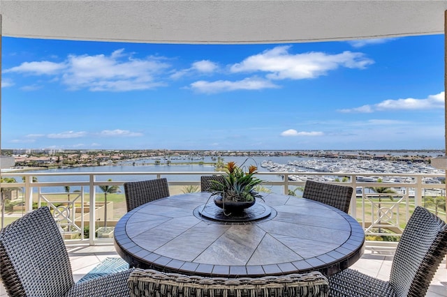 130 Riviera Dunes Way Unit 502, Palmetto, FL 34221 - balcony featuring outdoor dining area and a water view