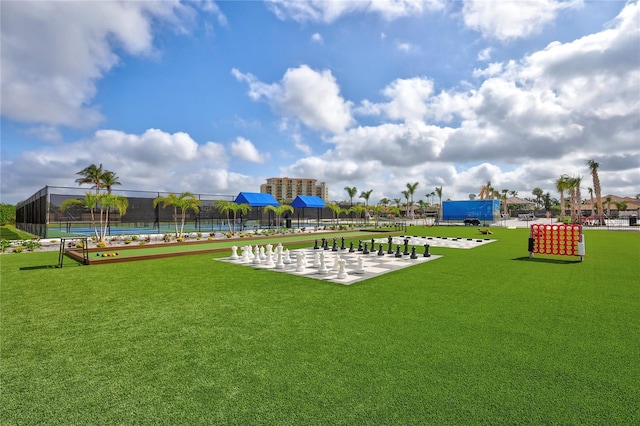 130 Riviera Dunes Way Unit 502, Palmetto, FL 34221 - view of home's community with a lawn and fence