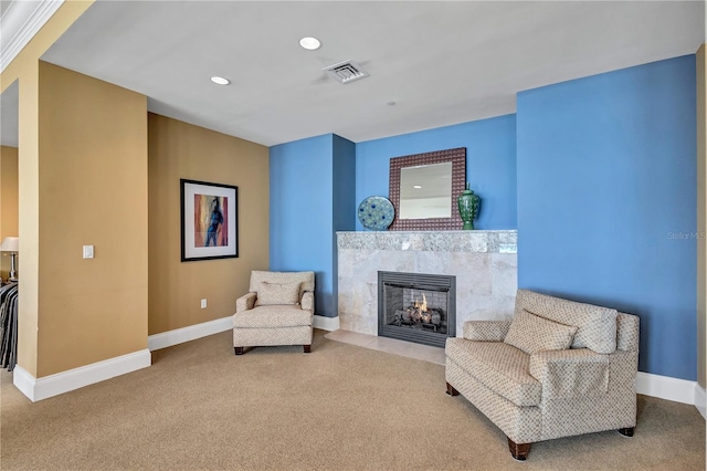 130 Riviera Dunes Way Unit 502, Palmetto, FL 34221 - living area with visible vents, baseboards, carpet, recessed lighting, and a premium fireplace