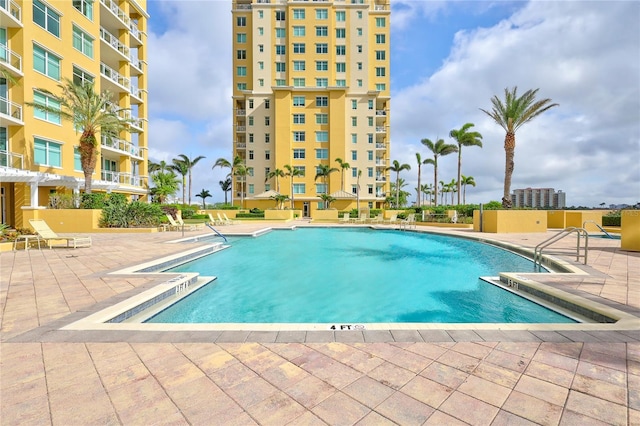 130 Riviera Dunes Way Unit 502, Palmetto, FL 34221 - community pool featuring a patio area