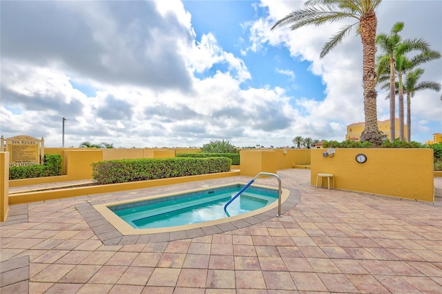 130 Riviera Dunes Way Unit 502, Palmetto, FL 34221 - view of swimming pool featuring a hot tub