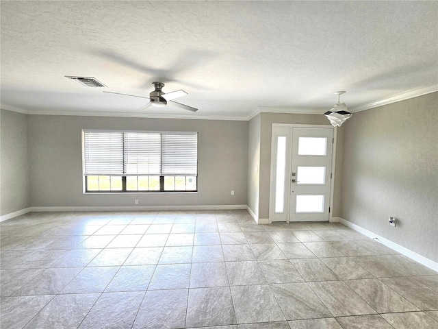 2204 34th St W, Bradenton, FL 34205 - foyer entrance with crown molding, a textured ceiling, a ceiling fan, baseboards, and light tile patterned floors