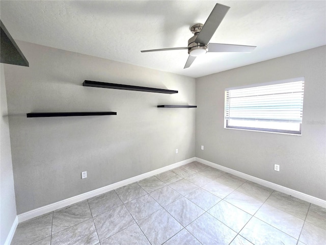 2204 34th St W, Bradenton, FL 34205 - unfurnished room with ceiling fan, baseboards, and light tile patterned floors
