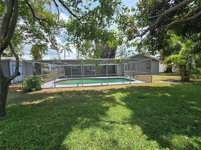 2204 34th St W, Bradenton, FL 34205 - swimming pool with a yard and glass enclosure