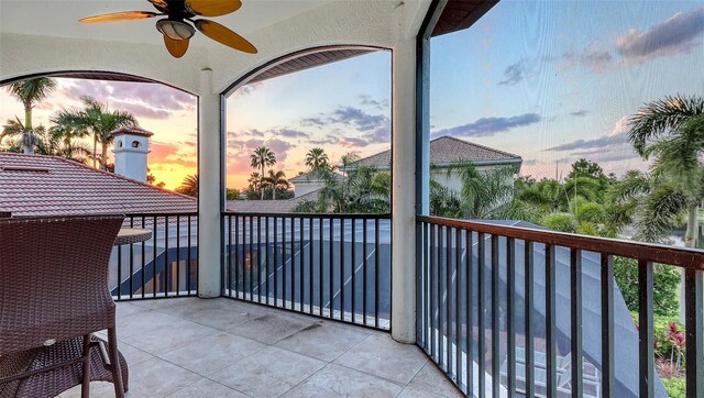balcony at dusk with ceiling fan