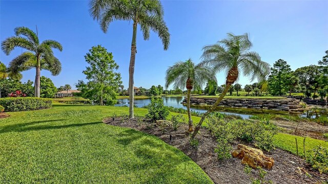6819 Dominion Ln, Lakewood Ranch, FL 34202 - view of grassy yard featuring a water view