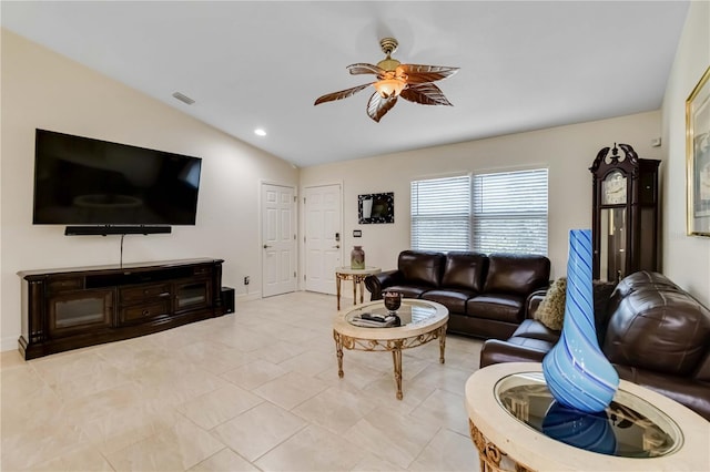 living room featuring ceiling fan, vaulted ceiling, and recessed lighting