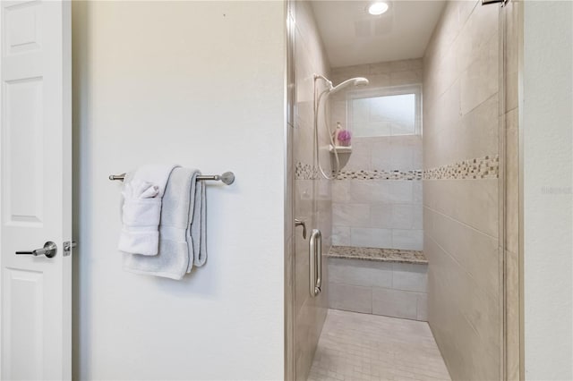bathroom featuring a shower stall and recessed lighting
