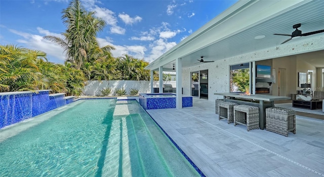 8001 20th Pl W, Bradenton, FL 34209 - view of swimming pool with a fenced in pool, ceiling fan, an in ground hot tub, and a patio area