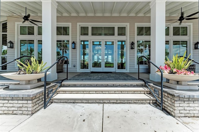 property entrance with ceiling fan and french doors