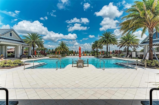 pool featuring a gazebo and a patio area