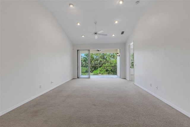 empty room with a ceiling fan, baseboards, recessed lighting, light carpet, and high vaulted ceiling