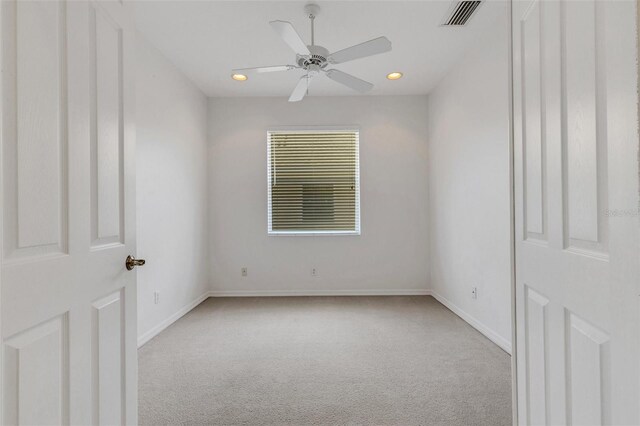 carpeted empty room with recessed lighting, ceiling fan, and baseboards