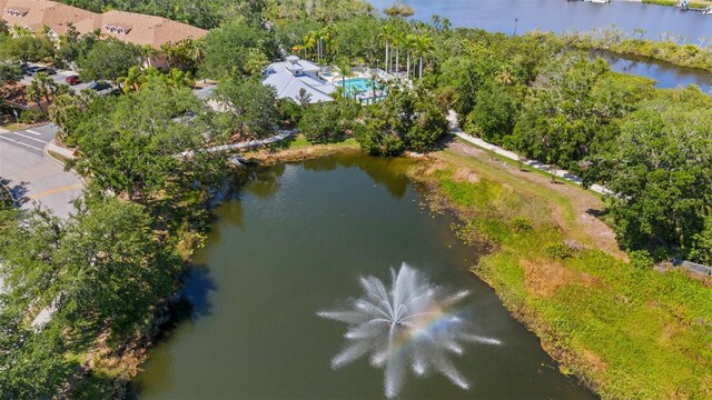 aerial view of property's location featuring a large body of water