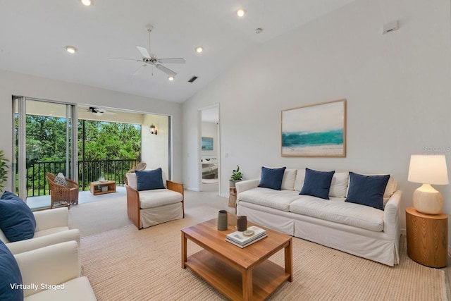 carpeted living area featuring ceiling fan, lofted ceiling, and recessed lighting