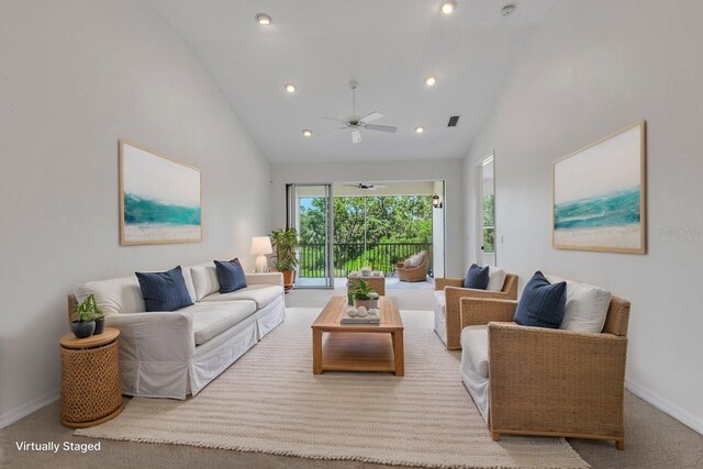 carpeted living room with high vaulted ceiling, ceiling fan, recessed lighting, and baseboards