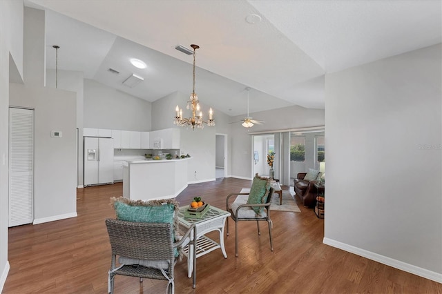 3007 Live Oak Ln, Palmetto, FL 34221 - sitting room featuring high vaulted ceiling, a chandelier, baseboards, a ceiling fan, and dark wood-style flooring