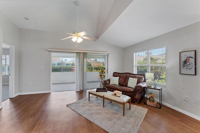 3007 Live Oak Ln, Palmetto, FL 34221 - living area with lofted ceiling, healthy amount of natural light, a ceiling fan, and wood finished floors