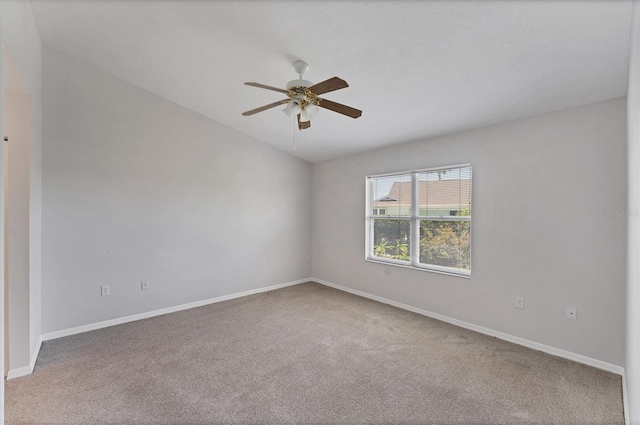3007 Live Oak Ln, Palmetto, FL 34221 - carpeted spare room featuring a ceiling fan, baseboards, and vaulted ceiling