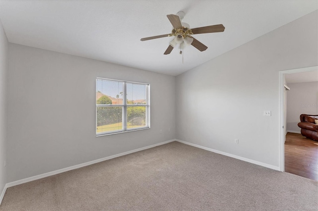 3007 Live Oak Ln, Palmetto, FL 34221 - carpeted spare room with a ceiling fan, baseboards, and vaulted ceiling