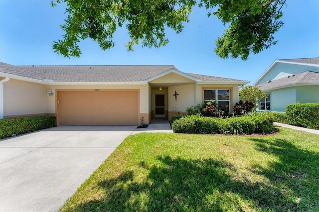 3007 Live Oak Ln, Palmetto, FL 34221 - ranch-style house featuring an attached garage, stucco siding, a front yard, and driveway
