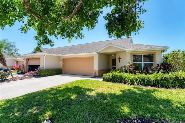 3007 Live Oak Ln, Palmetto, FL 34221 - ranch-style home with stucco siding, a garage, a front yard, and driveway
