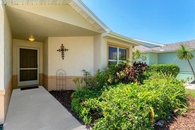 3007 Live Oak Ln, Palmetto, FL 34221 - view of exterior entry featuring stucco siding