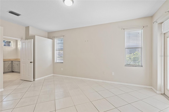 12014 Beeflower Dr, Lakewood Ranch, FL 34202 - unfurnished bedroom featuring visible vents and baseboards