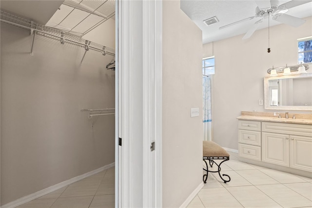 12014 Beeflower Dr, Lakewood Ranch, FL 34202 - full bathroom with a ceiling fan, tile patterned floors, visible vents, and vanity