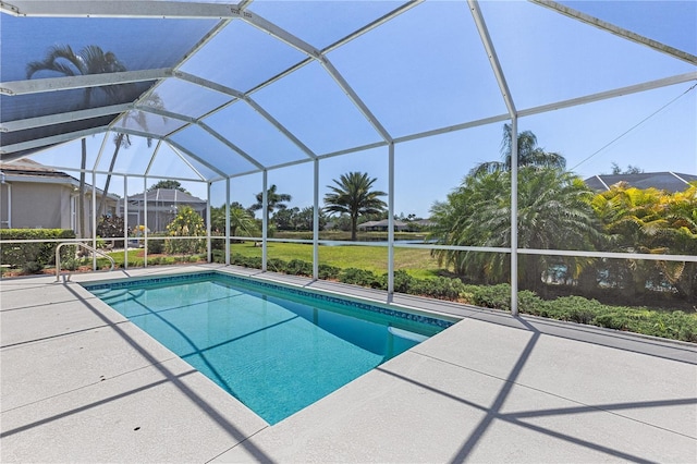 12014 Beeflower Dr, Lakewood Ranch, FL 34202 - outdoor pool with glass enclosure and a patio