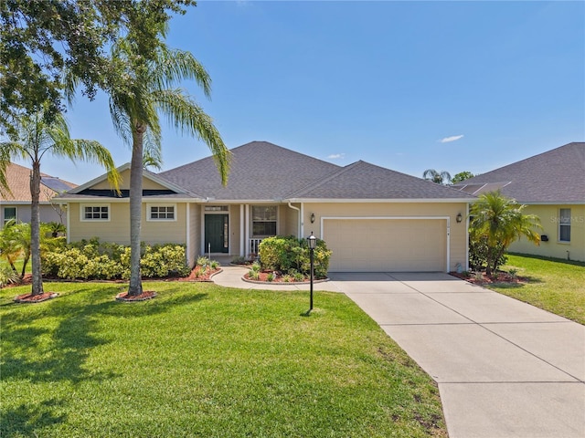 12014 Beeflower Dr, Lakewood Ranch, FL 34202 - ranch-style home featuring concrete driveway, an attached garage, and a front yard