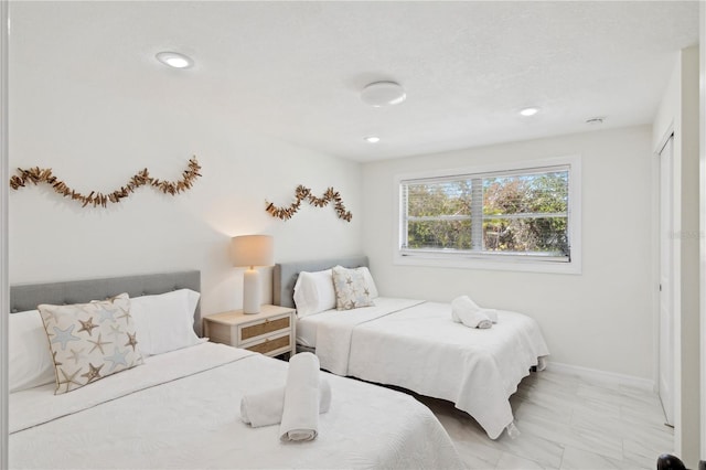578-580 Companion Way, Longboat Key, FL 34228 - bedroom with baseboards, recessed lighting, and marble finish floor