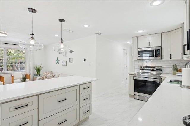 578-580 Companion Way, Longboat Key, FL 34228 - kitchen featuring stainless steel appliances, backsplash, light countertops, and marble finish floor