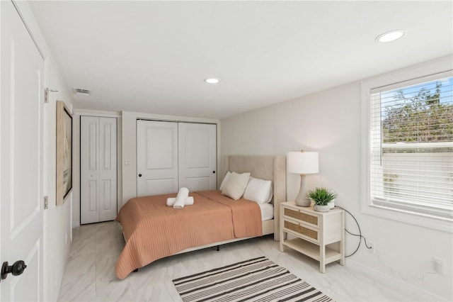 578-580 Companion Way, Longboat Key, FL 34228 - bedroom featuring visible vents, multiple closets, recessed lighting, and marble finish floor