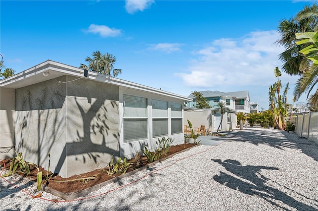 578-580 Companion Way, Longboat Key, FL 34228 - view of home's exterior with fence and a patio