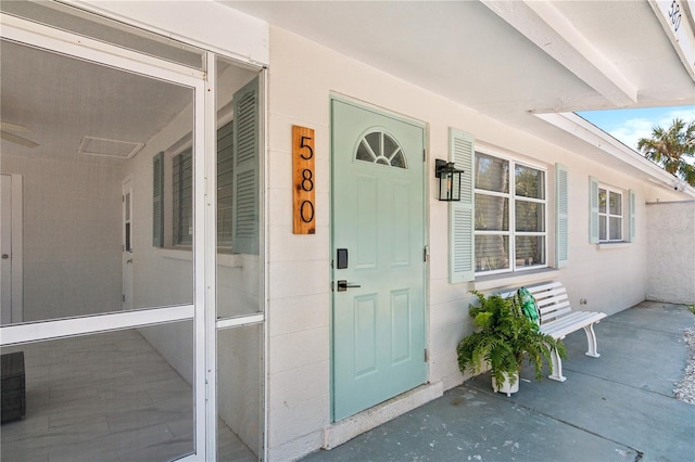 578-580 Companion Way, Longboat Key, FL 34228 - doorway to property featuring covered porch