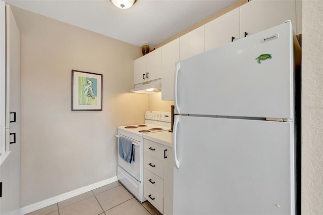 kitchen with light tile patterned floors, baseboards, white appliances, under cabinet range hood, and light countertops