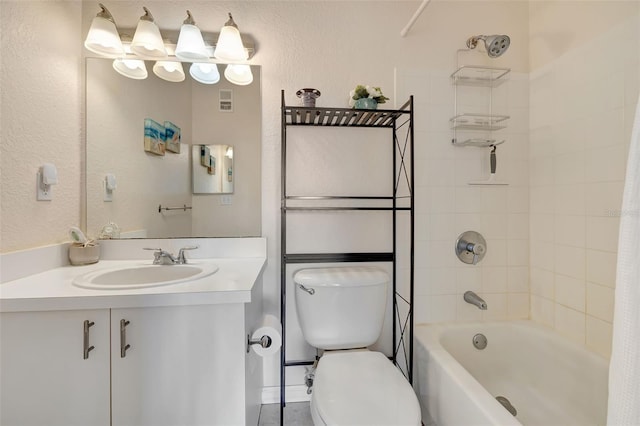 full bath with vanity, toilet, and bathtub / shower combination