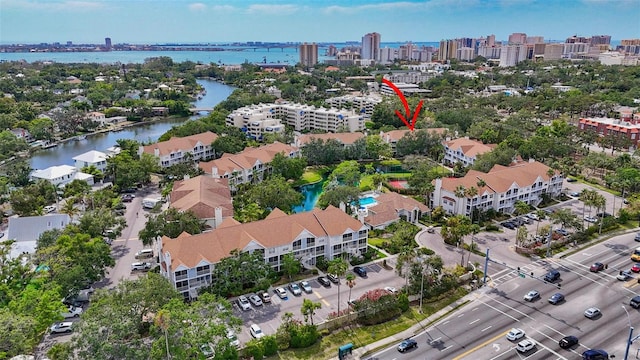 drone / aerial view with a water view and a view of city