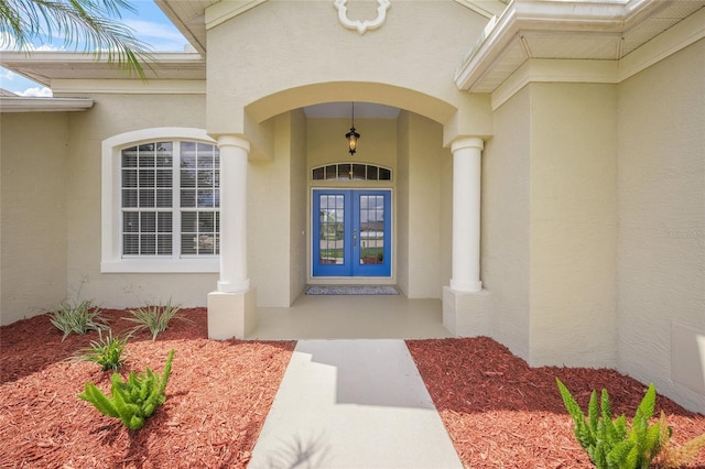 9106 Yarberry St, Sarasota, FL 34240 - property entrance with stucco siding and french doors