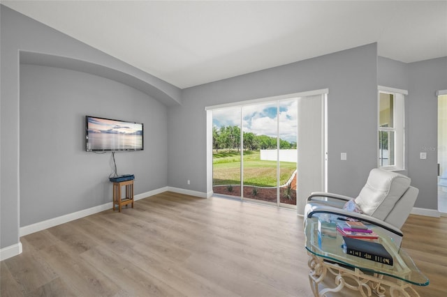 9106 Yarberry St, Sarasota, FL 34240 - living area with baseboards and light wood-style flooring