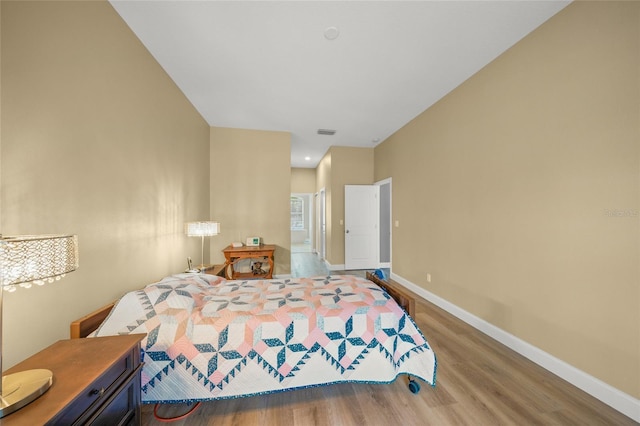 9106 Yarberry St, Sarasota, FL 34240 - bedroom with baseboards, visible vents, and wood finished floors