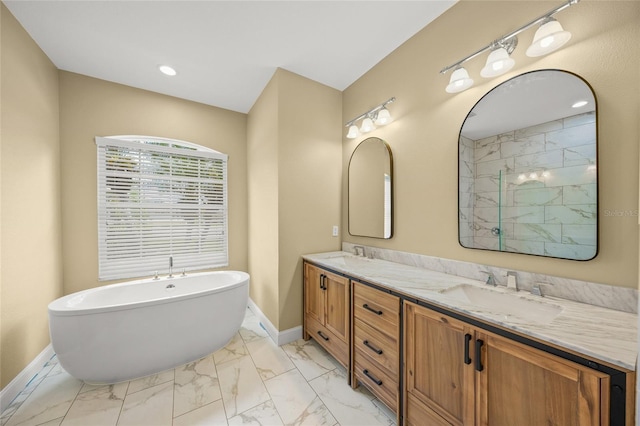 9106 Yarberry St, Sarasota, FL 34240 - full bathroom with baseboards, marble finish floor, double vanity, and a sink