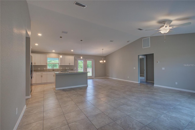 25 Sabot Ct, Placida, FL 33946 - kitchen featuring visible vents, open floor plan, and lofted ceiling