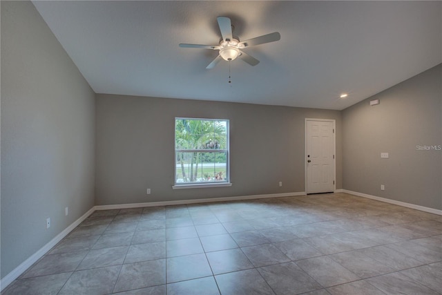 25 Sabot Ct, Placida, FL 33946 - spare room with ceiling fan, tile patterned floors, and baseboards