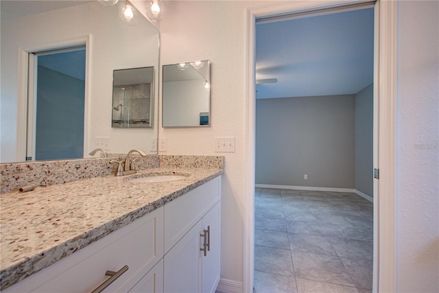 25 Sabot Ct, Placida, FL 33946 - bathroom featuring vanity and baseboards