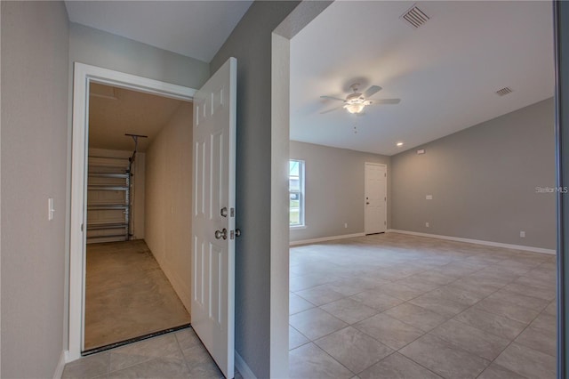 25 Sabot Ct, Placida, FL 33946 - hallway featuring baseboards, visible vents, and light tile patterned floors